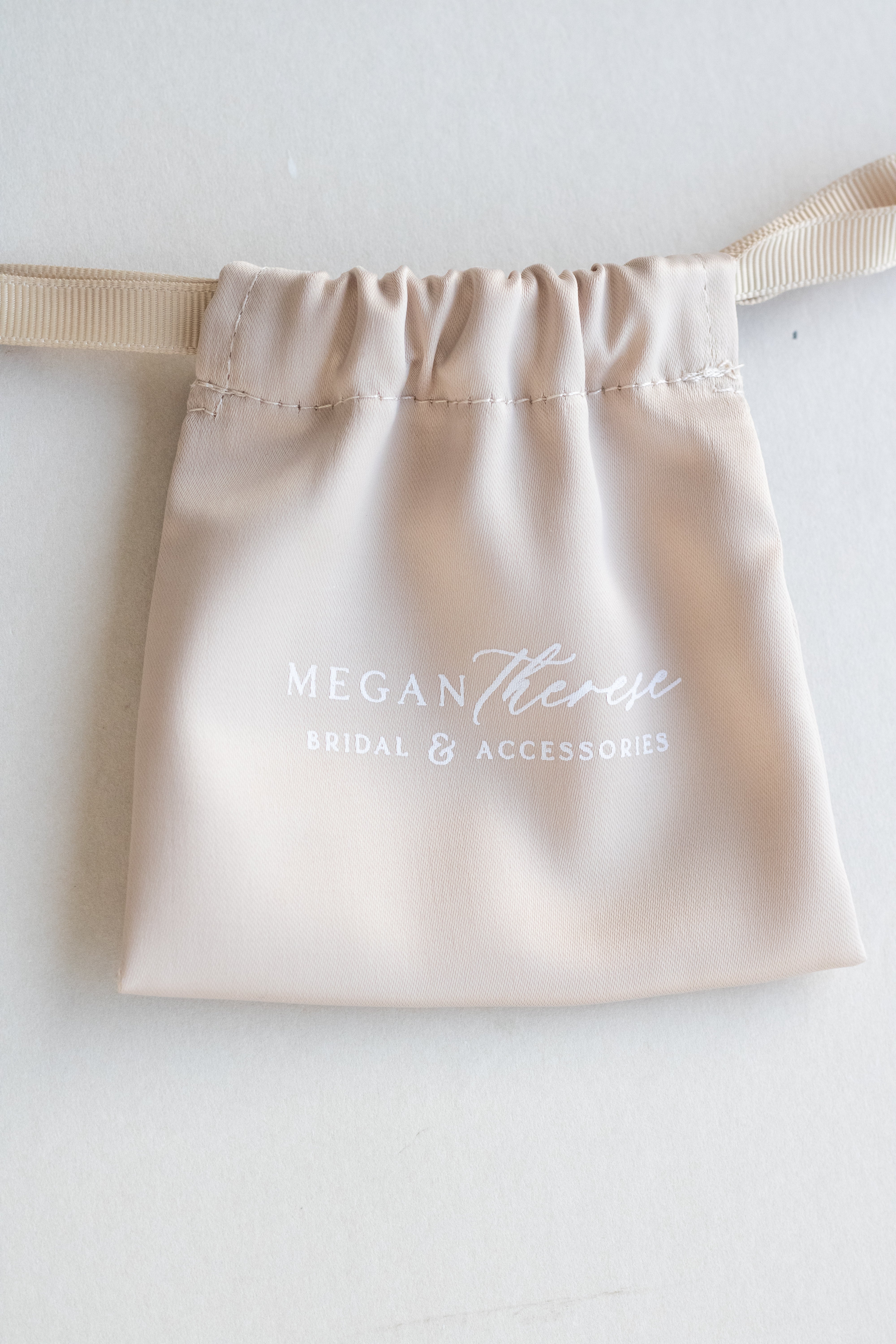 Soft satin jewellery pouch by Megan Therese