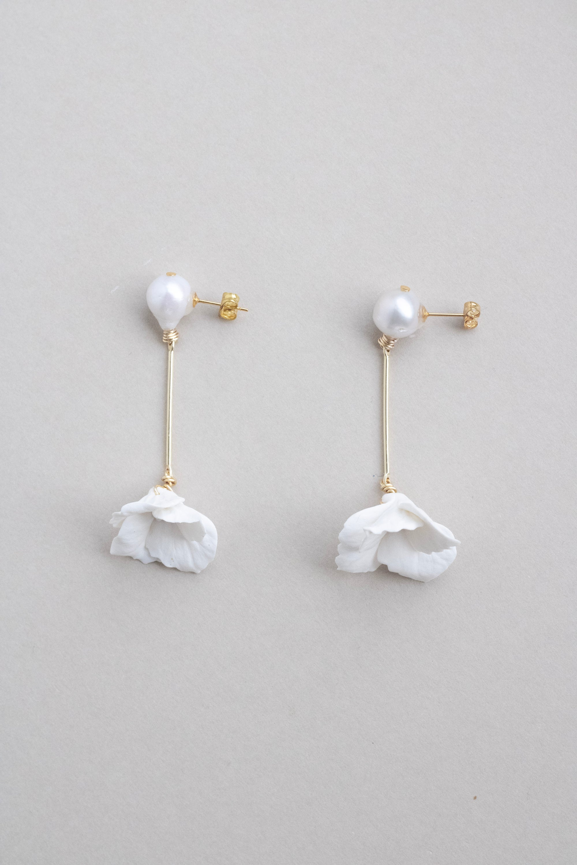 Pearl and clay flower drop earrings by megan therese