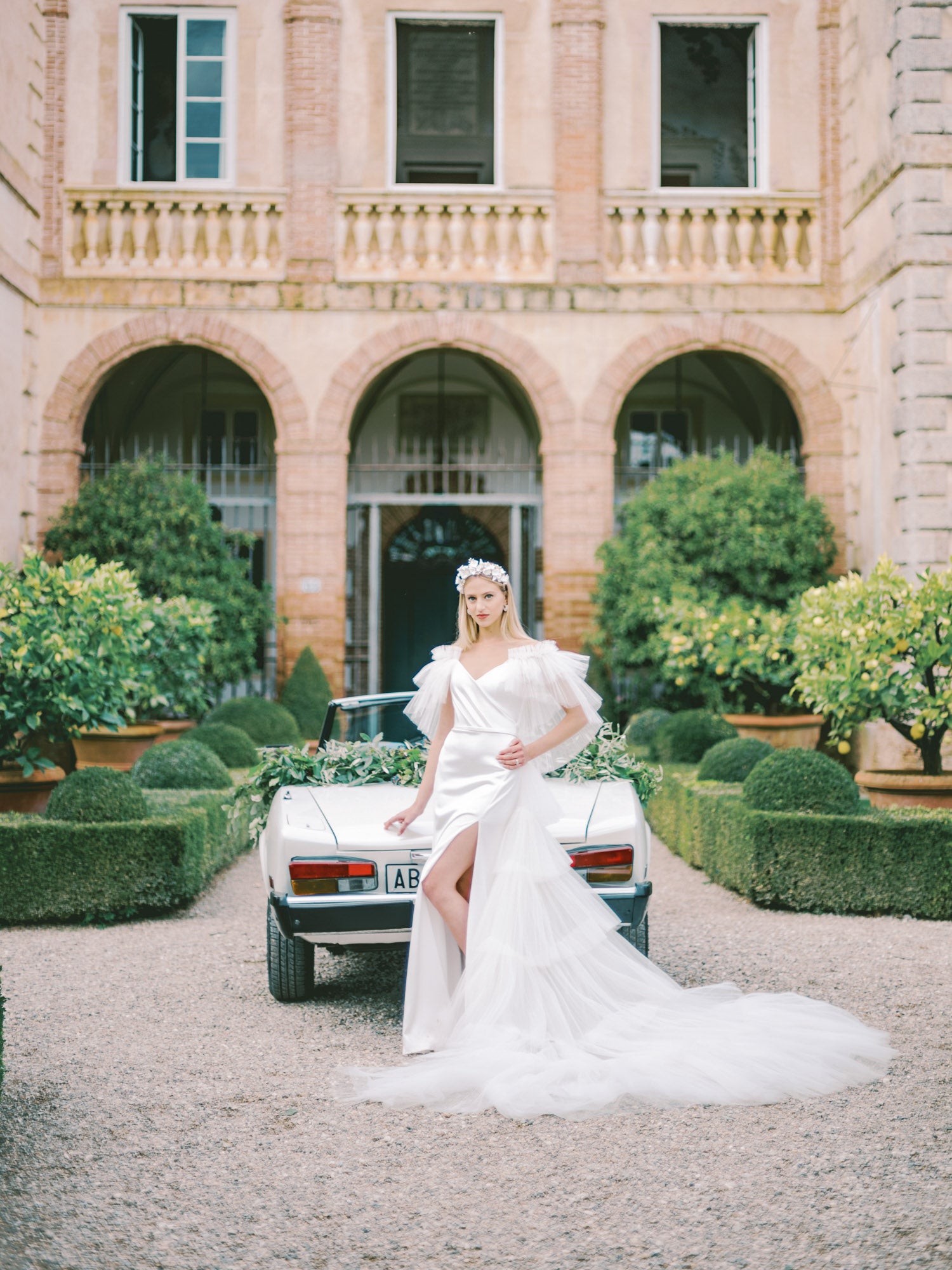 real bride in italy wearing couture dress and headpiece