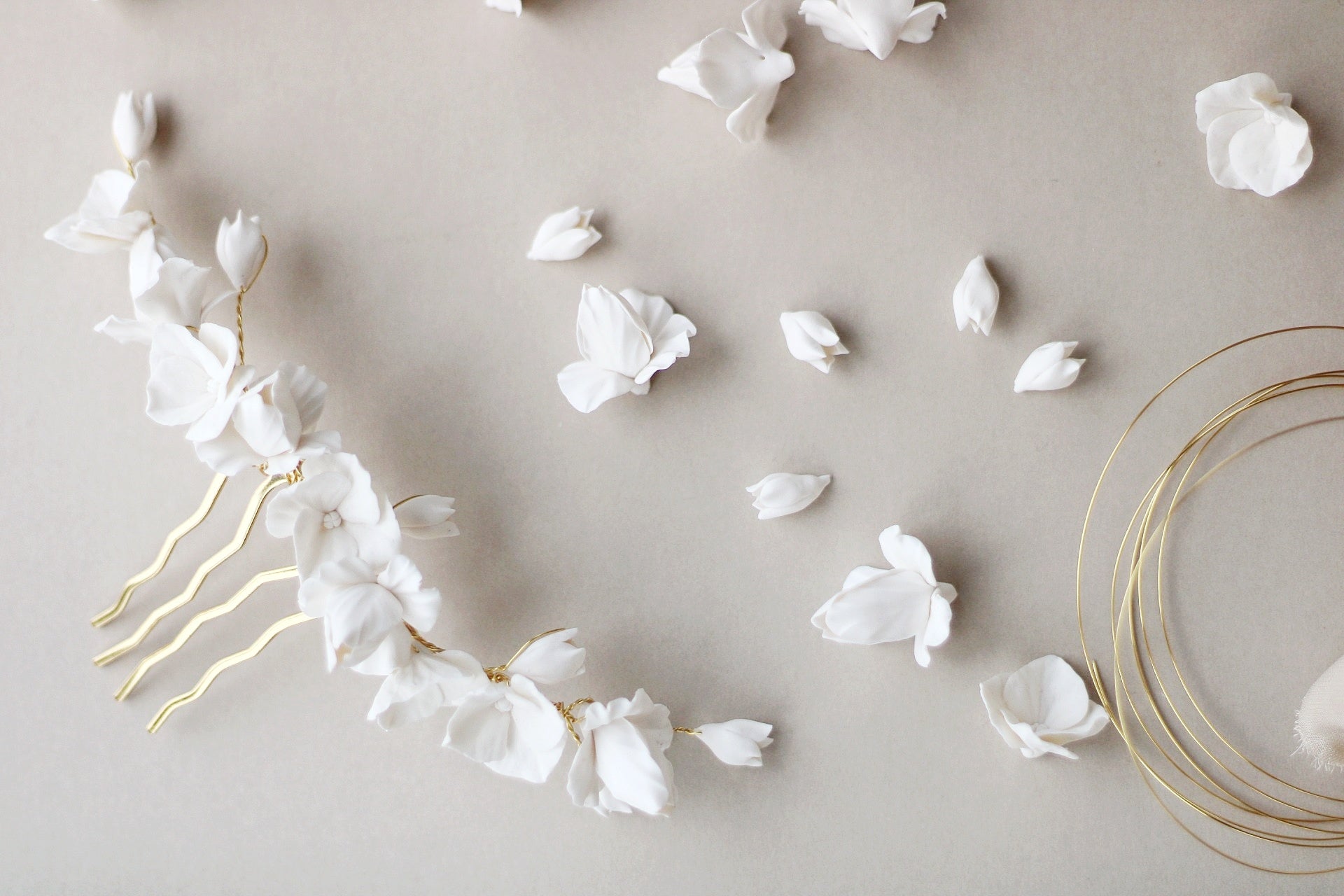 ethereal bridal comb made of clay flowers