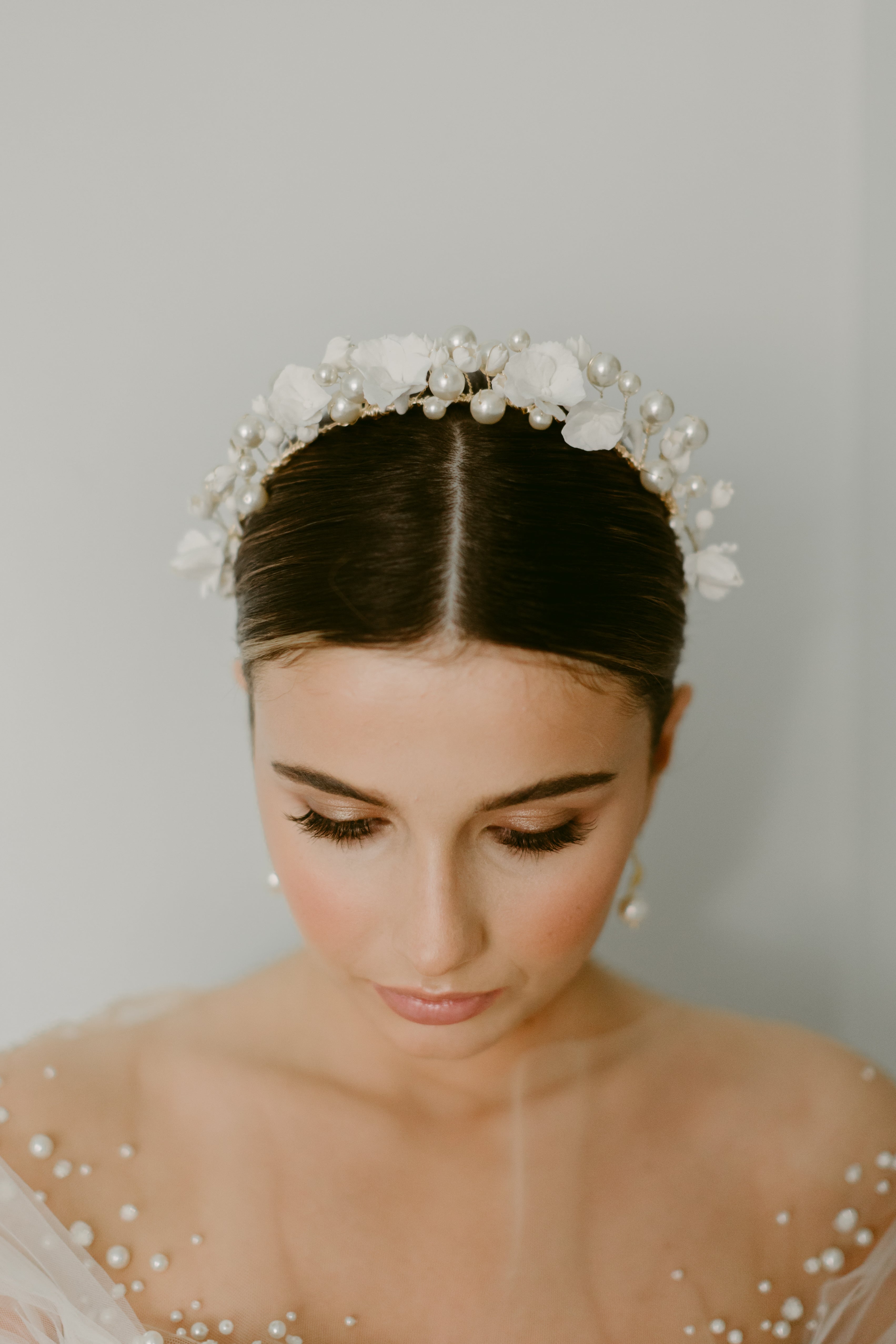 bridal portrait of bride wearing beautiful wedding crown by megan therese