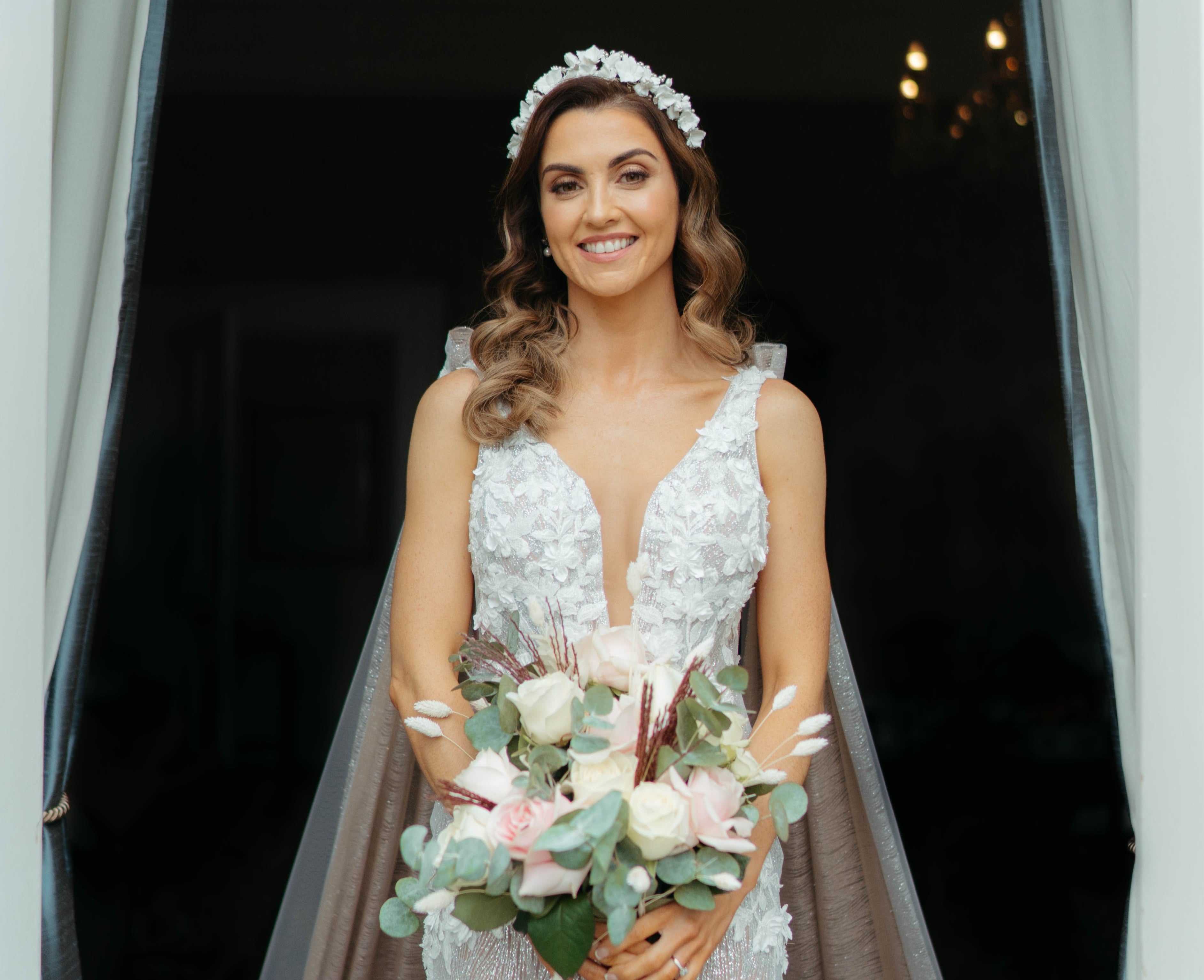 bride wearing luxury bridal crown by megan therese