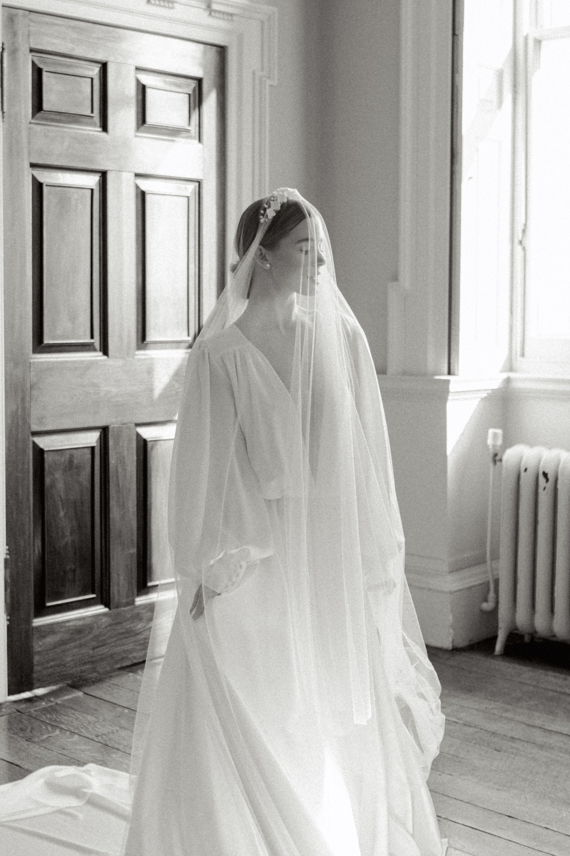 fine art bride in couture bridal accessories and veil by megan therese